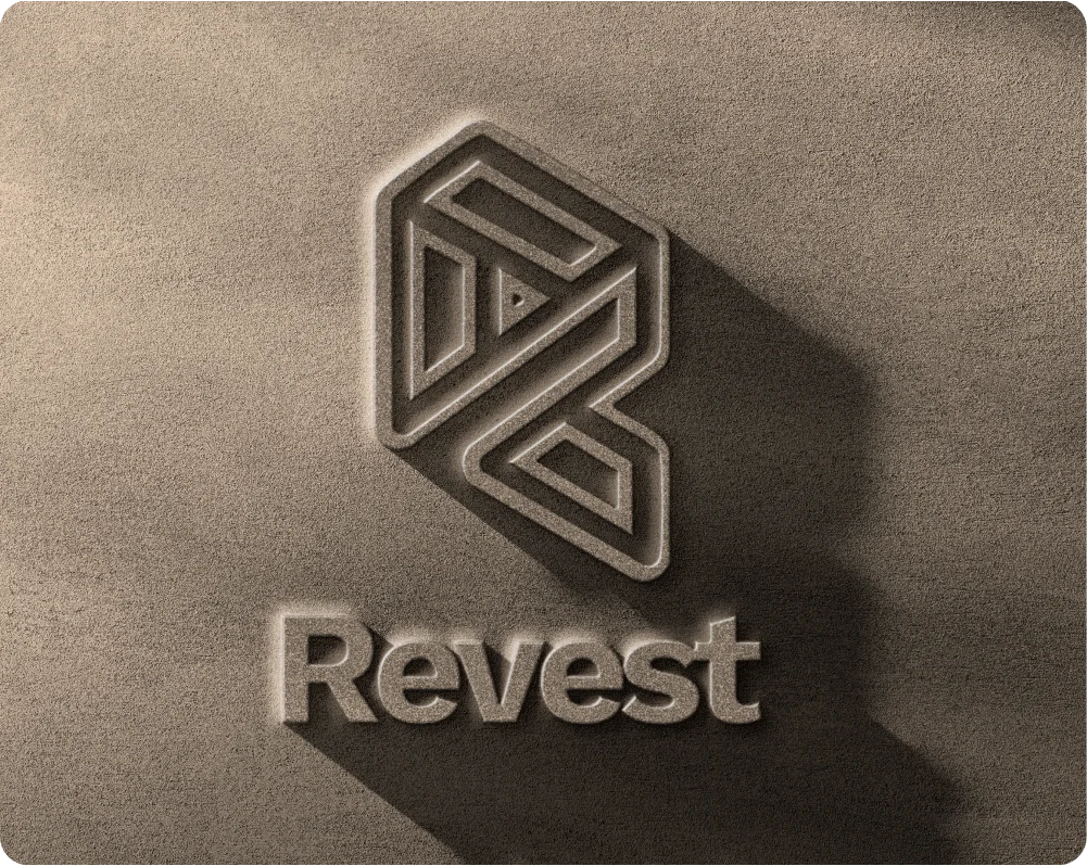 Revest brand identity mark rendered as an embossed logo